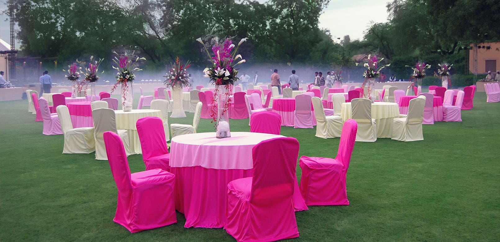 The open-air Gulmohar Lawns wedding venue at Gulmohar Greens Golf & Country Club, Ahmedabad, with manicured lawns and landscaping