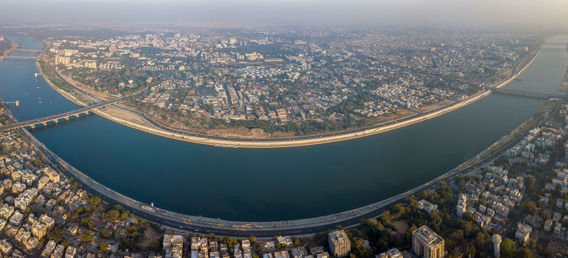 Aerial view of the Sabarmati Riverfront in Ahmedabad with the river curving through the city